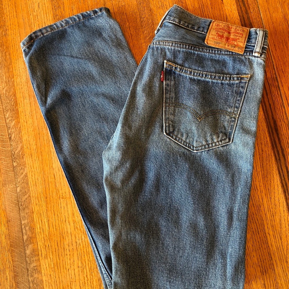 Levi's 505 (men's) 33 x 34 straight leg medium-wash blue jeans